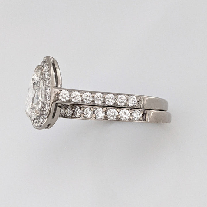 18K WHITE .83 CARAT TOTAL SI2 F DIAMOND PEAR WITH ROUNDS ESTATE RING/ BAND SET