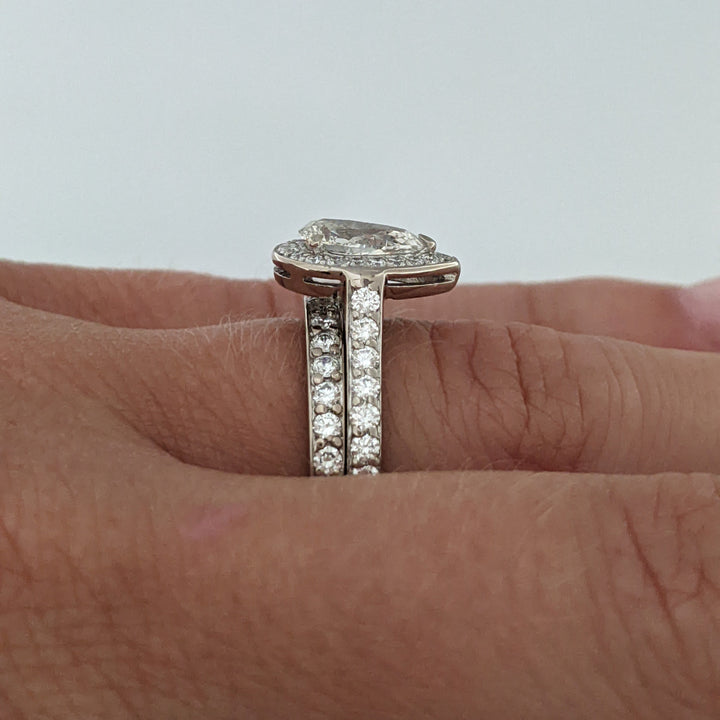 18K WHITE .83 CARAT TOTAL SI2 F DIAMOND PEAR WITH ROUNDS ESTATE RING/ BAND SET