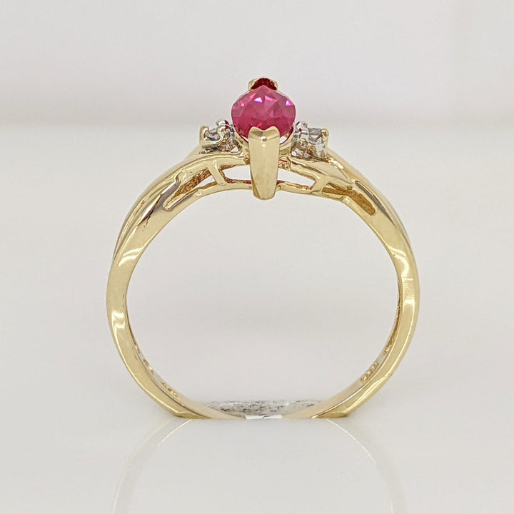 10K SYNTHETIC RUBY MARQUISE 4X8 WITH (2) MELEE ESTATE RING 1.4 GRAMS