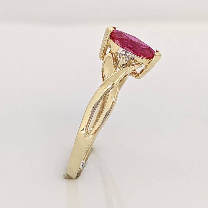 10K SYNTHETIC RUBY MARQUISE 4X8 WITH (2) MELEE ESTATE RING 1.4 GRAMS