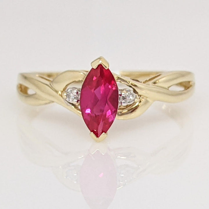 10K SYNTHETIC RUBY MARQUISE 4X8 WITH (2) MELEE ESTATE RING 1.4 GRAMS