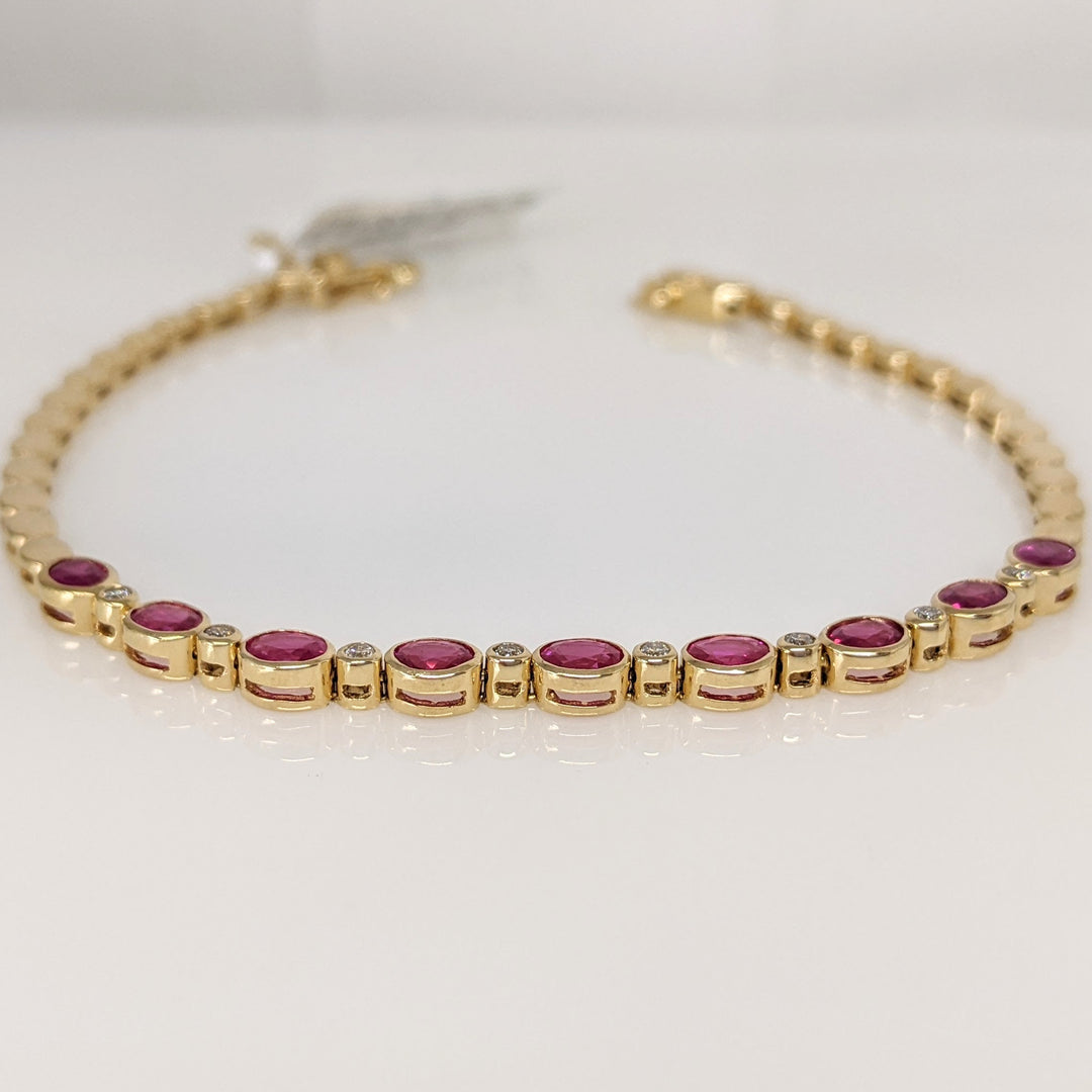 14K RUBY OVAL 3X4 (9) WITH .12 DIAMOND TOTAL WEIGHT ESTATE BRACELET 8.0 GRAMS