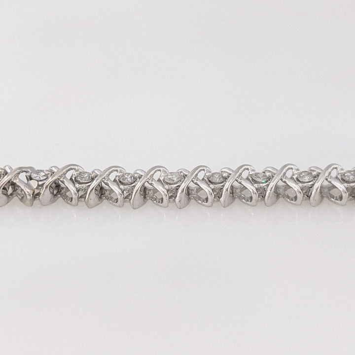 14K WHITE 1.28 CARAT TOTAL WEIGHT I1 I DIAMOND ROUND (32) "X" LINK ESTATE BRACELET 15.1 GRAMS