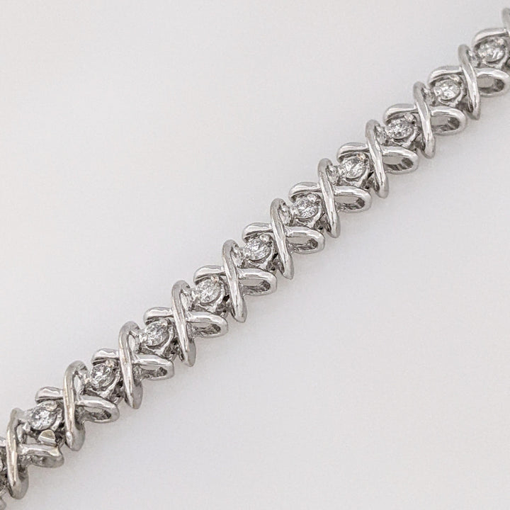 14K WHITE 1.28 CARAT TOTAL WEIGHT I1 I DIAMOND ROUND (32) "X" LINK ESTATE BRACELET 15.1 GRAMS