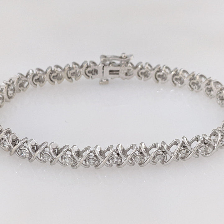 14K WHITE 1.28 CARAT TOTAL WEIGHT I1 I DIAMOND ROUND (32) "X" LINK ESTATE BRACELET 15.1 GRAMS
