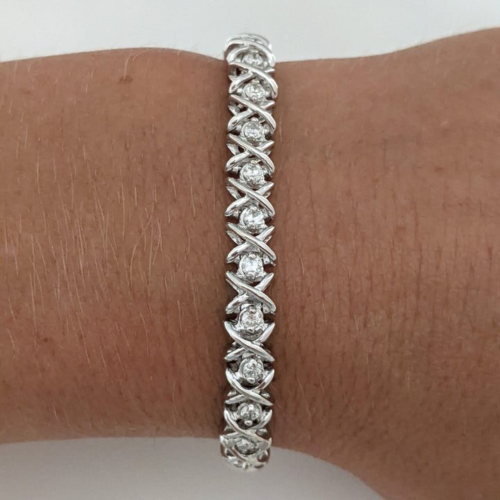 14K WHITE 1.28 CARAT TOTAL WEIGHT I1 I DIAMOND ROUND (32) "X" LINK ESTATE BRACELET 15.1 GRAMS