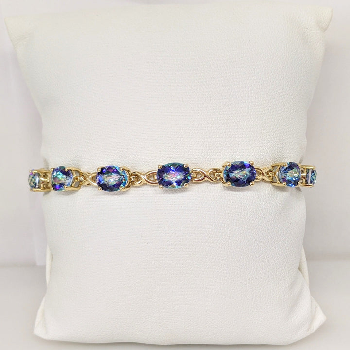 14K MYSTIC TOPAZ OVAL (13) 6X8 ESTATE BRACELET 12.1 GRAMS