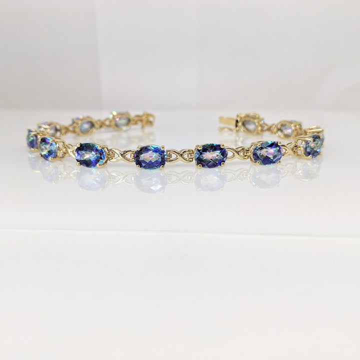 14K MYSTIC TOPAZ OVAL (13) 6X8 ESTATE BRACELET 12.1 GRAMS