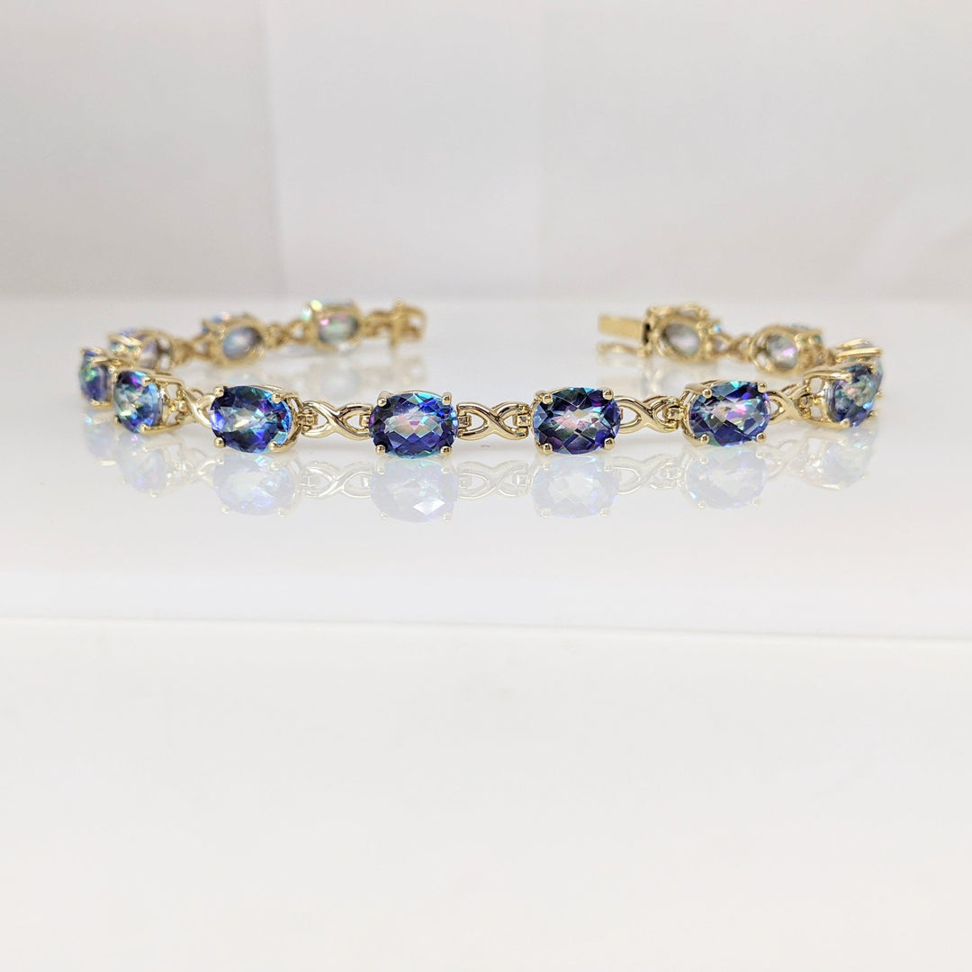 14K MYSTIC TOPAZ OVAL (13) 6X8 ESTATE BRACELET 12.1 GRAMS