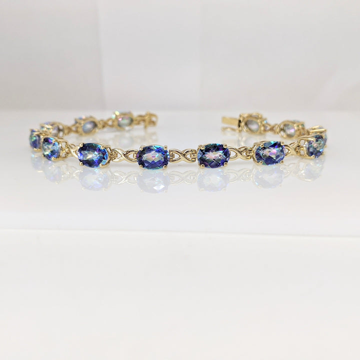 14K MYSTIC TOPAZ OVAL (13) 6X8 ESTATE BRACELET 12.1 GRAMS