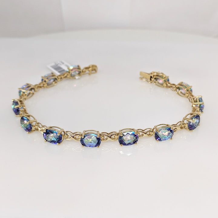 14K MYSTIC TOPAZ OVAL (13) 6X8 ESTATE BRACELET 12.1 GRAMS