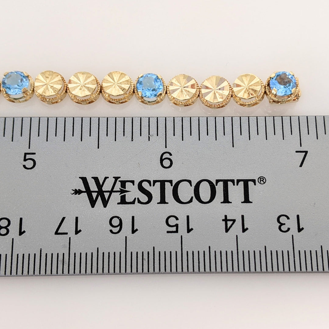 14K BLUE TOPAZ ROUND (7) 5MM TENNIS ESTATE BRACELET 10.4 GRAMS