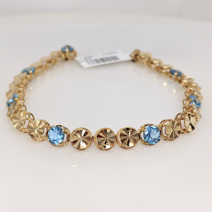 14K BLUE TOPAZ ROUND (7) 5MM TENNIS ESTATE BRACELET 10.4 GRAMS