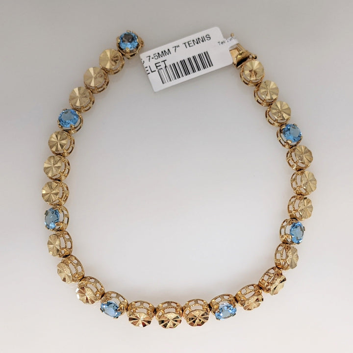 14K BLUE TOPAZ ROUND (7) 5MM TENNIS ESTATE BRACELET 10.4 GRAMS