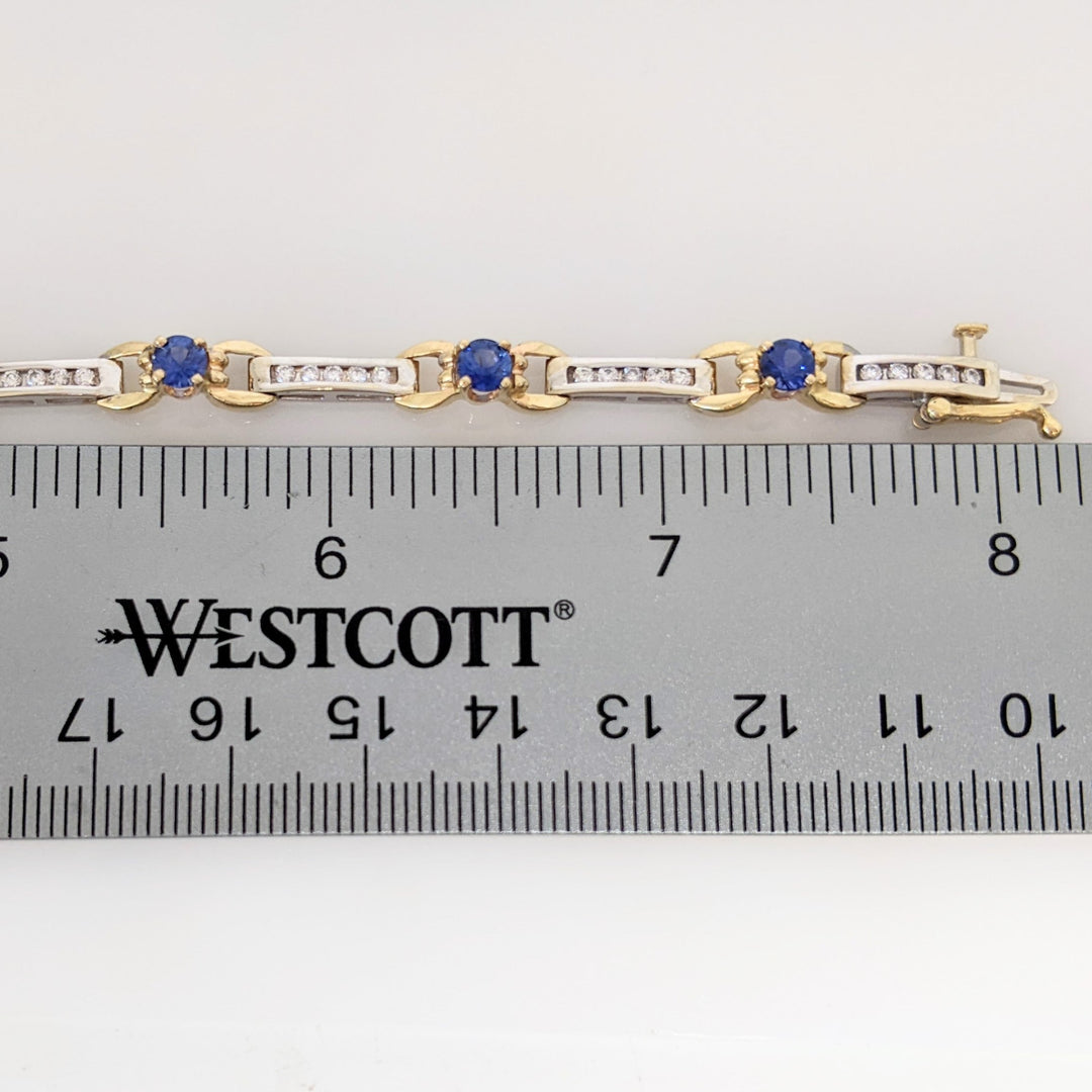 14K TWO-TONE LAB CREATED SAPPHIRE ROUND (8) 4MM WITH .67 DIAMOND CARAT TOTAL WEIGHT ESTATE BRACELET 12.7 GRAMS