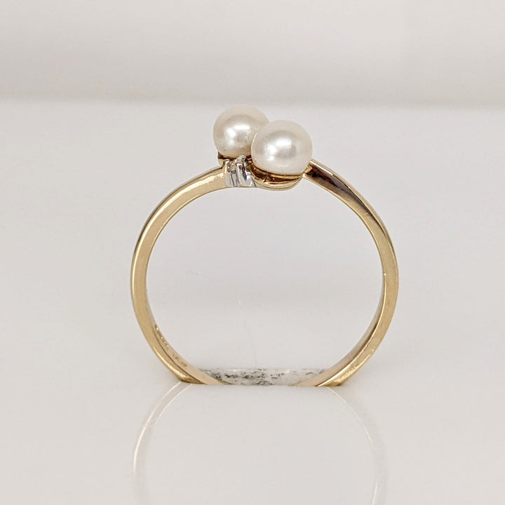 14K PEARL ROUND (2) 4MM BYPASS WITH MELEE ESTATE RING 1.4 GRAMS