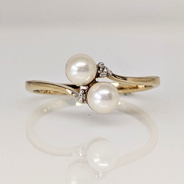 14K PEARL ROUND (2) 4MM BYPASS WITH MELEE ESTATE RING 1.4 GRAMS