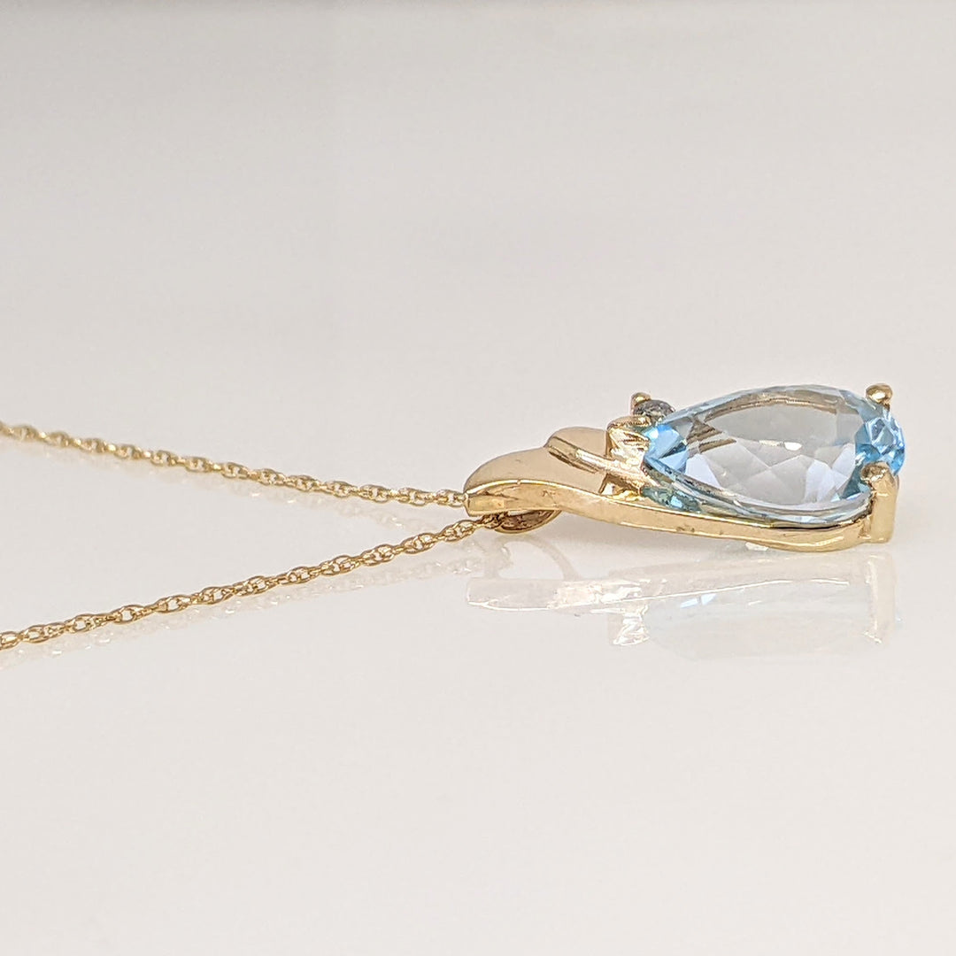 14K BLUE TOPAZ PEAR 8X10 WITH MELEE ESTATE PENDANT & CHAIN 2.3 GRAMS