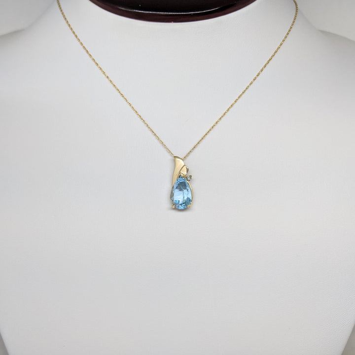 14K BLUE TOPAZ PEAR 8X10 WITH MELEE ESTATE PENDANT & CHAIN 2.3 GRAMS