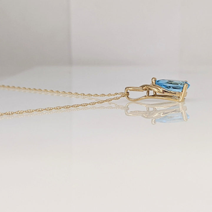 10K BLUE TOPAZ PEAR 6X9 WITH MELEE ESTATE PENDANT & CHAIN 1.8 GRAMS