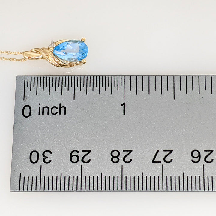 10K BLUE TOPAZ PEAR 6X9 WITH MELEE ESTATE PENDANT & CHAIN 1.8 GRAMS