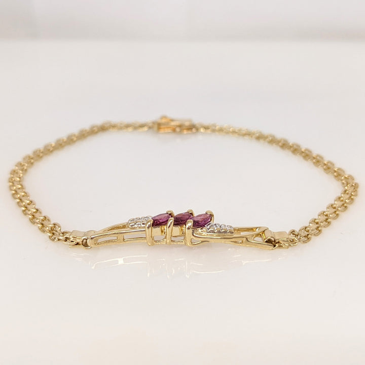14K RUBY MARQUISE (3) 2.5X5 WITH MELEE ESTATE BRACELET 4.5 GRAMS