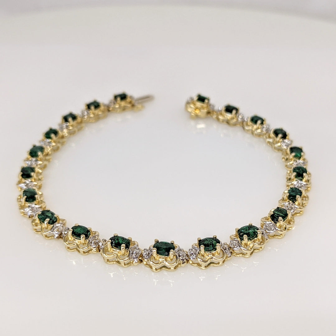 14K EMERALD OVAL 3X4 (21) WITH .50 DIAMOND TOTAL WEIGHT (42) ROUND ESTATE BRACELET 10.8 GRAMS
