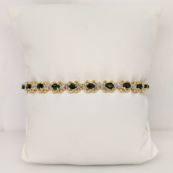 14K EMERALD OVAL 3X4 (21) WITH .50 DIAMOND TOTAL WEIGHT (42) ROUND ESTATE BRACELET 10.8 GRAMS