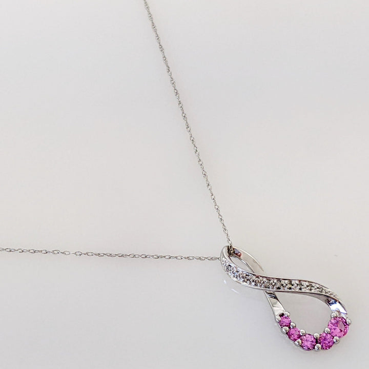 10K WHITE LAB-CREATED PINK SAPPHIRE ROUND (5) WITH (8) MELEE ESTATE TWIST PENDANT & CHAIN 1.8 GRAMS