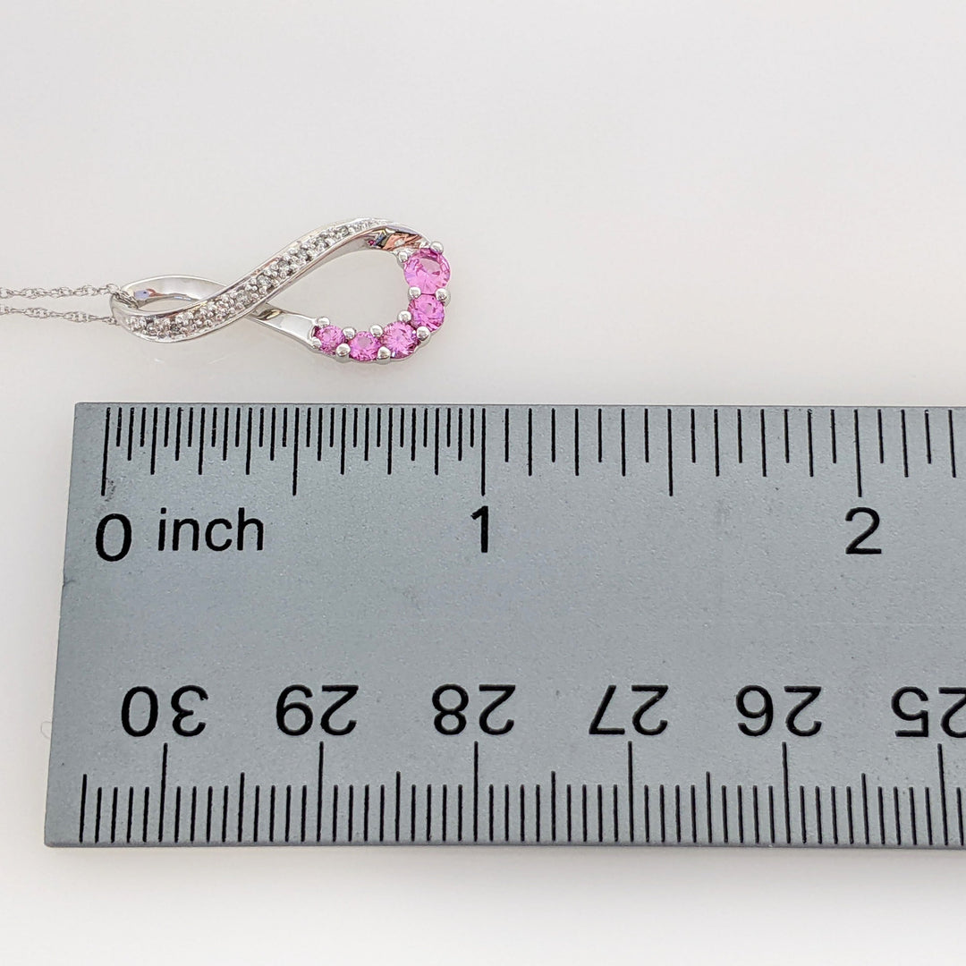 10K WHITE LAB-CREATED PINK SAPPHIRE ROUND (5) WITH (8) MELEE ESTATE TWIST PENDANT & CHAIN 1.8 GRAMS