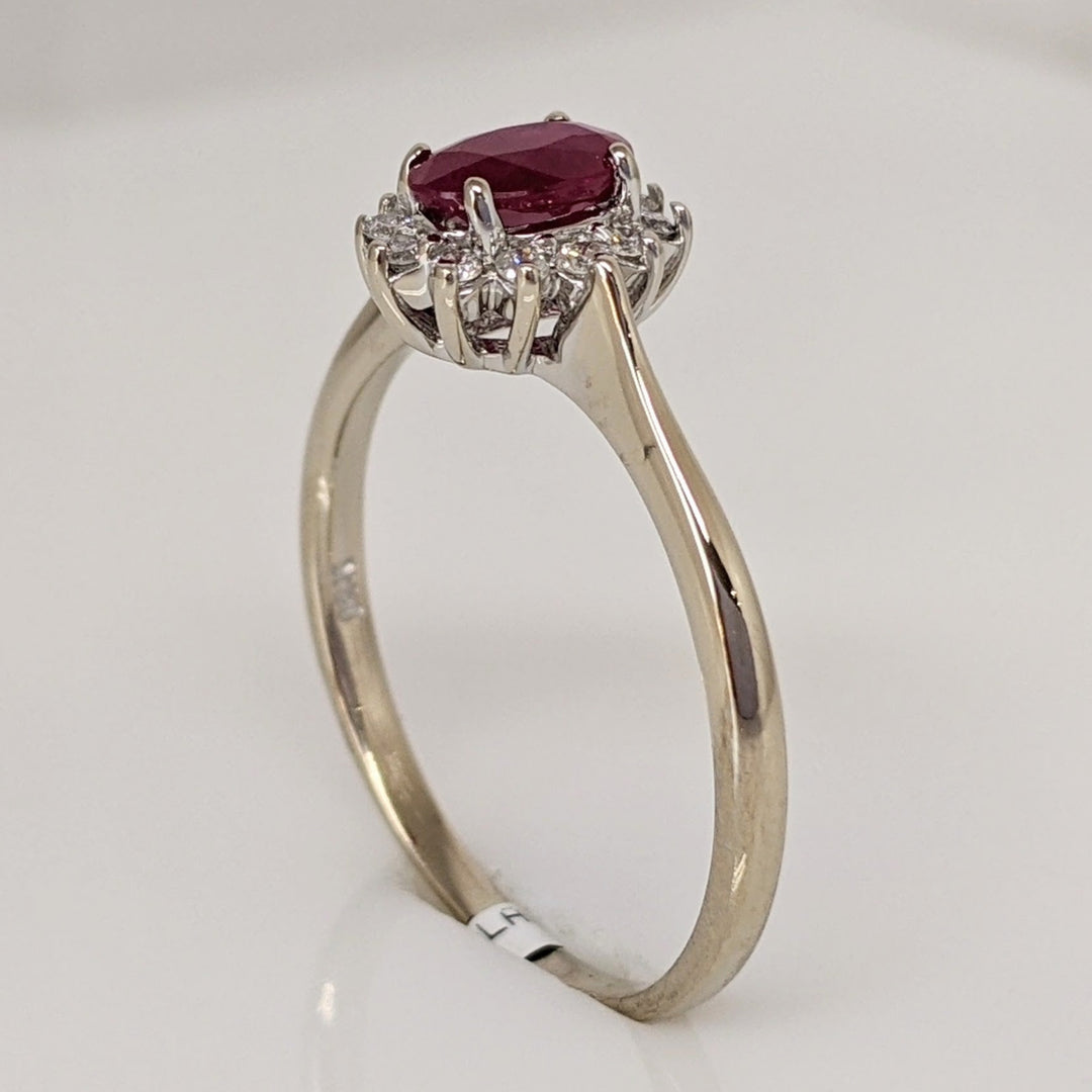 14K WHITE CLARITY ENHANCED RUBY OVAL 4X6 WITH .12 DIAMOND TOTAL WEIGHT ESTATE RING 2.1 GRAMS