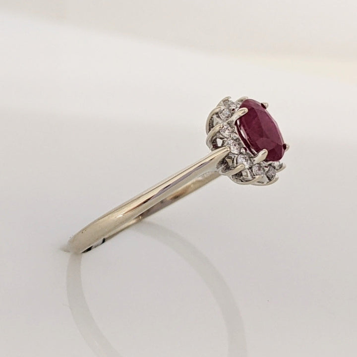 14K WHITE CLARITY ENHANCED RUBY OVAL 4X6 WITH .12 DIAMOND TOTAL WEIGHT ESTATE RING 2.1 GRAMS