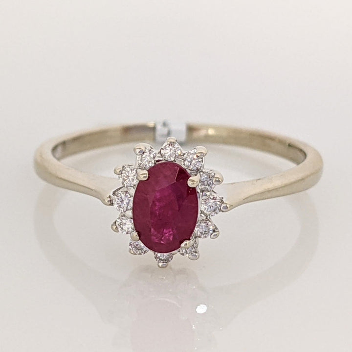 14K WHITE CLARITY ENHANCED RUBY OVAL 4X6 WITH .12 DIAMOND TOTAL WEIGHT ESTATE RING 2.1 GRAMS