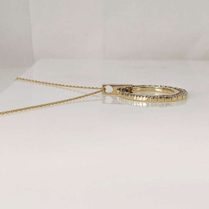 14K .62 CARAT TOTAL WEIGHT I1 I DIAMOND ROUND (31) TWO- CIRCLE PENDANT & CHAIN 8.2 GRAMS