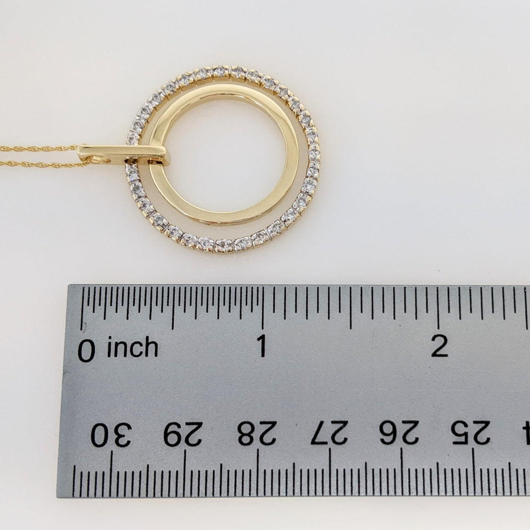 14K .62 CARAT TOTAL WEIGHT I1 I DIAMOND ROUND (31) TWO- CIRCLE PENDANT & CHAIN 8.2 GRAMS