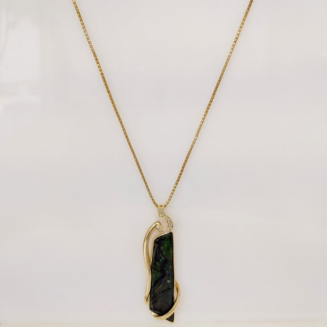14K AMMOLITE FREE FORM 10X42 WITH (9) MELEE ESTATE PENDANT & CHAIN 9.9 GRAMS