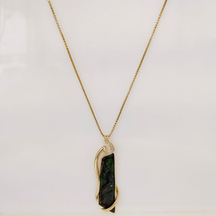 14K AMMOLITE FREE FORM 10X42 WITH (9) MELEE ESTATE PENDANT & CHAIN 9.9 GRAMS