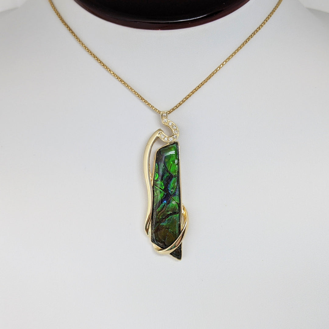 14K AMMOLITE FREE FORM 10X42 WITH (9) MELEE ESTATE PENDANT & CHAIN 9.9 GRAMS