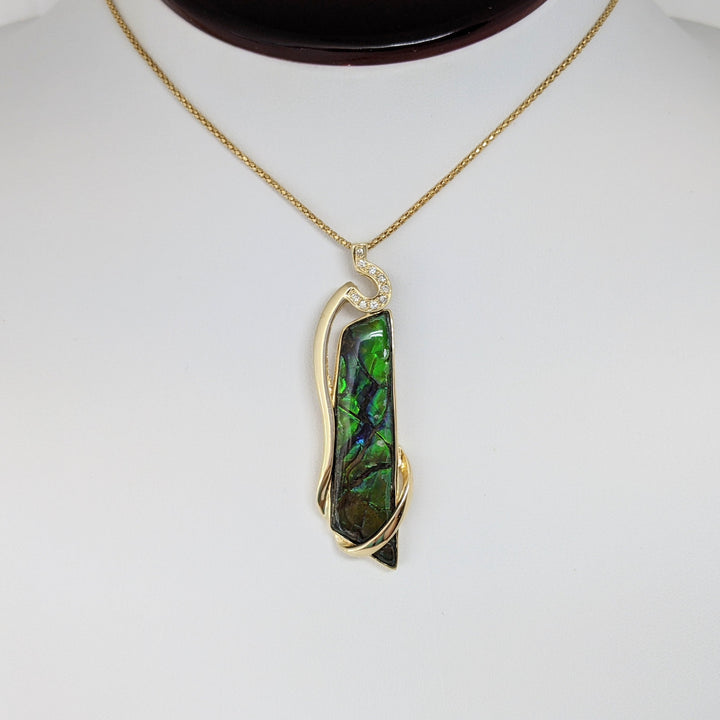 14K AMMOLITE FREE FORM 10X42 WITH (9) MELEE ESTATE PENDANT & CHAIN 9.9 GRAMS