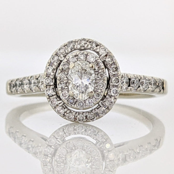 14K WHITE .59 CARAT TOTAL WEIGHT I1 H DIAMOND OVAL (1) ROUND (45) ESTATE HALO RING 2.9 GRAMS