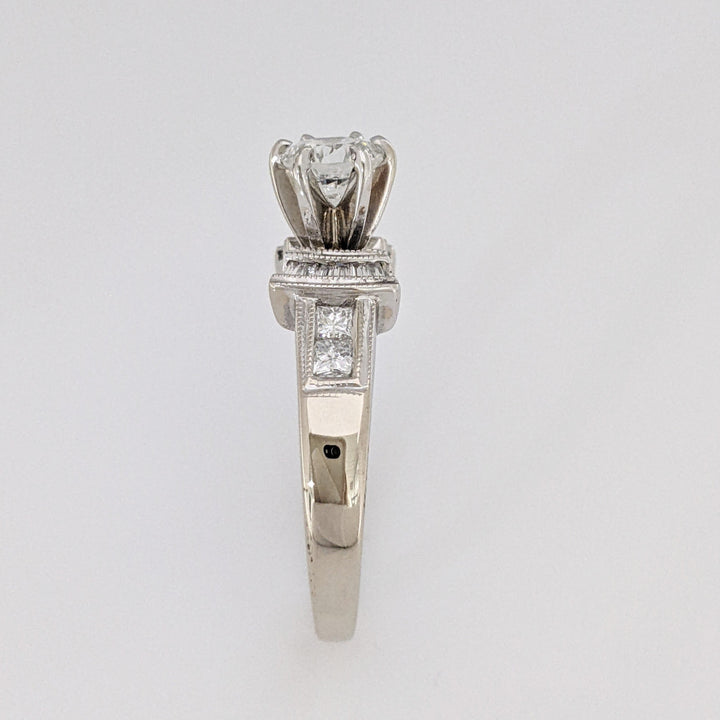 18K WHITE .70 CARAT TOTAL VS2 E DIAMOND ROUND WITH (12) BAGUETTE CUT AND (4) PRINCESS CUT ESTATE RING 5.4 GRAMS