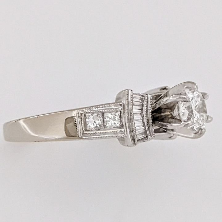 18K WHITE .70 CARAT TOTAL VS2 E DIAMOND ROUND WITH (12) BAGUETTE CUT AND (4) PRINCESS CUT ESTATE RING 5.4 GRAMS