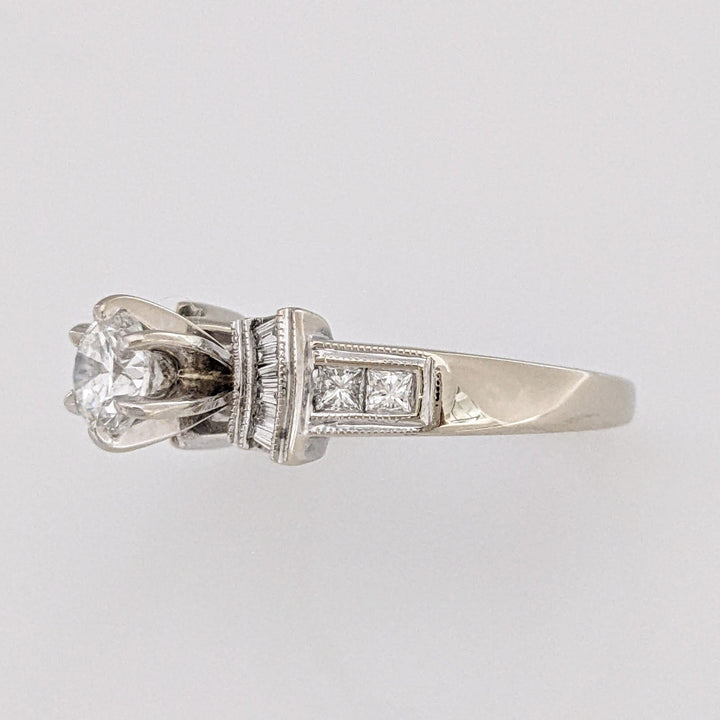 18K WHITE .70 CARAT TOTAL VS2 E DIAMOND ROUND WITH (12) BAGUETTE CUT AND (4) PRINCESS CUT ESTATE RING 5.4 GRAMS
