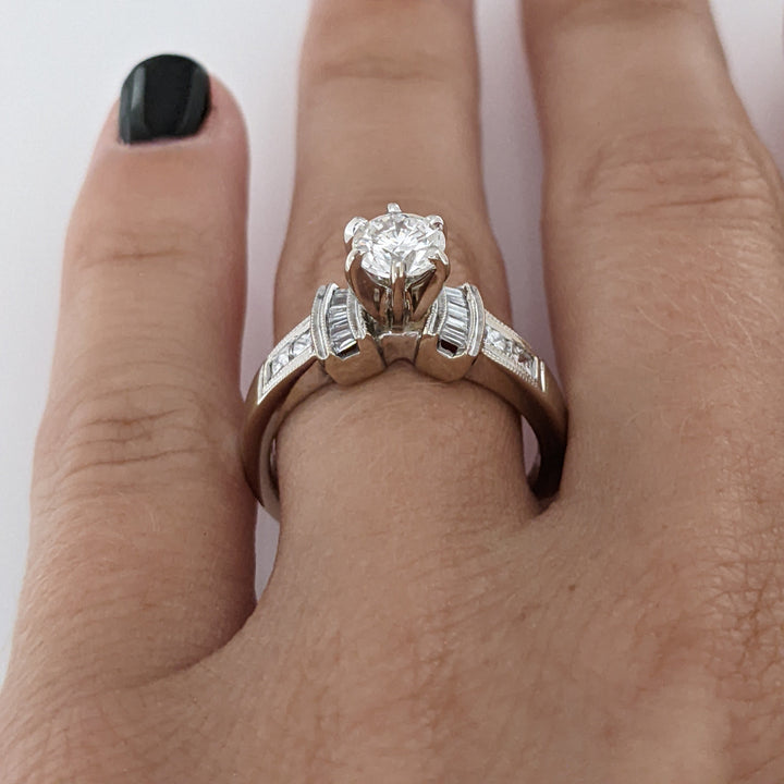 18K WHITE .70 CARAT TOTAL VS2 E DIAMOND ROUND WITH (12) BAGUETTE CUT AND (4) PRINCESS CUT ESTATE RING 5.4 GRAMS