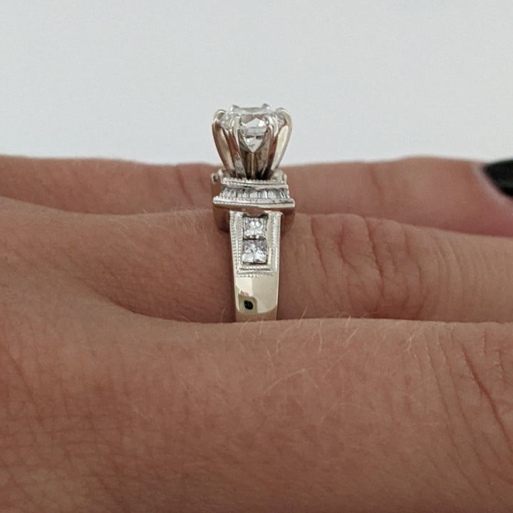 18K WHITE .70 CARAT TOTAL VS2 E DIAMOND ROUND WITH (12) BAGUETTE CUT AND (4) PRINCESS CUT ESTATE RING 5.4 GRAMS