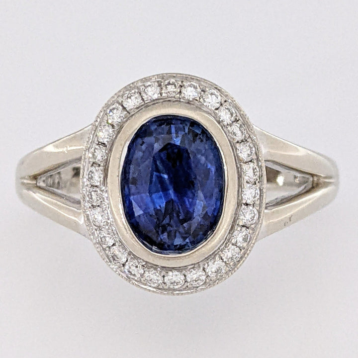 14K CEYLON SAPPHIRE OVAL 1.40 CARAT TOTAL WITH .15 DIAMOND TOTAL WEIGHT BEZEL ESTATE RING 4.6 GRAMS