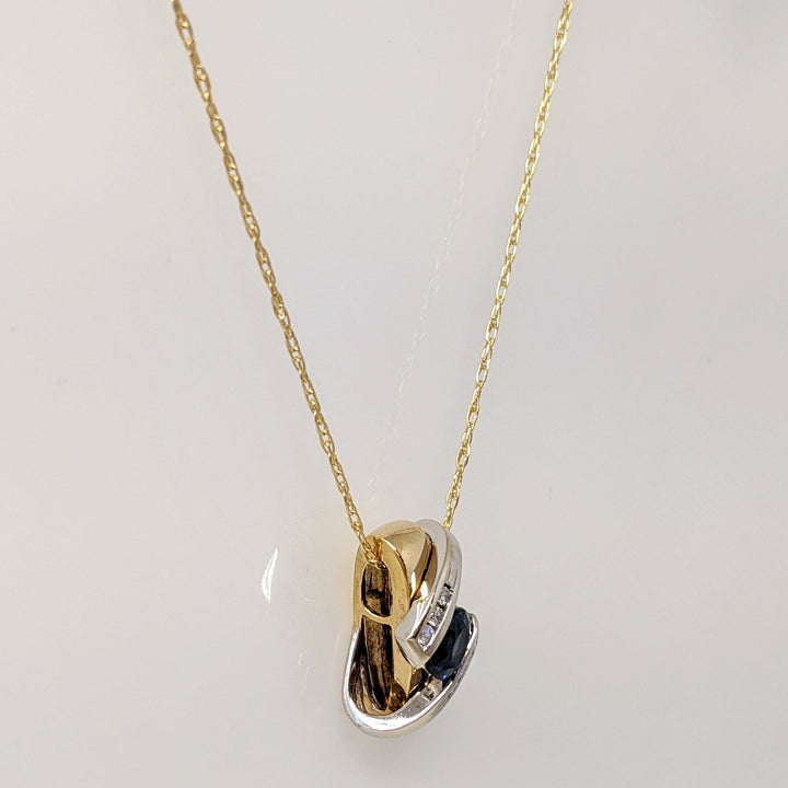 18K TWO-TONE SAPPHIRE OVAL 4X5 WITH (6) MELEE ESTATE "X" PENDANT & 14K CHAIN 3.1 GRAMS
