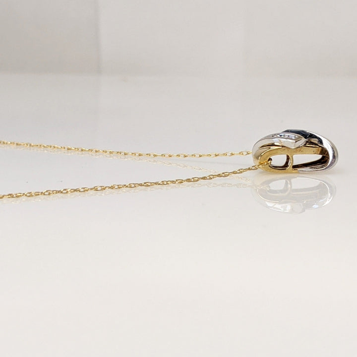 18K TWO-TONE SAPPHIRE OVAL 4X5 WITH (6) MELEE ESTATE "X" PENDANT & 14K CHAIN 3.1 GRAMS
