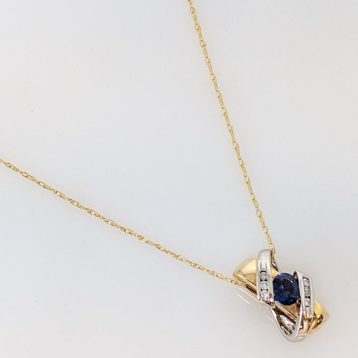 18K TWO-TONE SAPPHIRE OVAL 4X5 WITH (6) MELEE ESTATE "X" PENDANT & 14K CHAIN 3.1 GRAMS