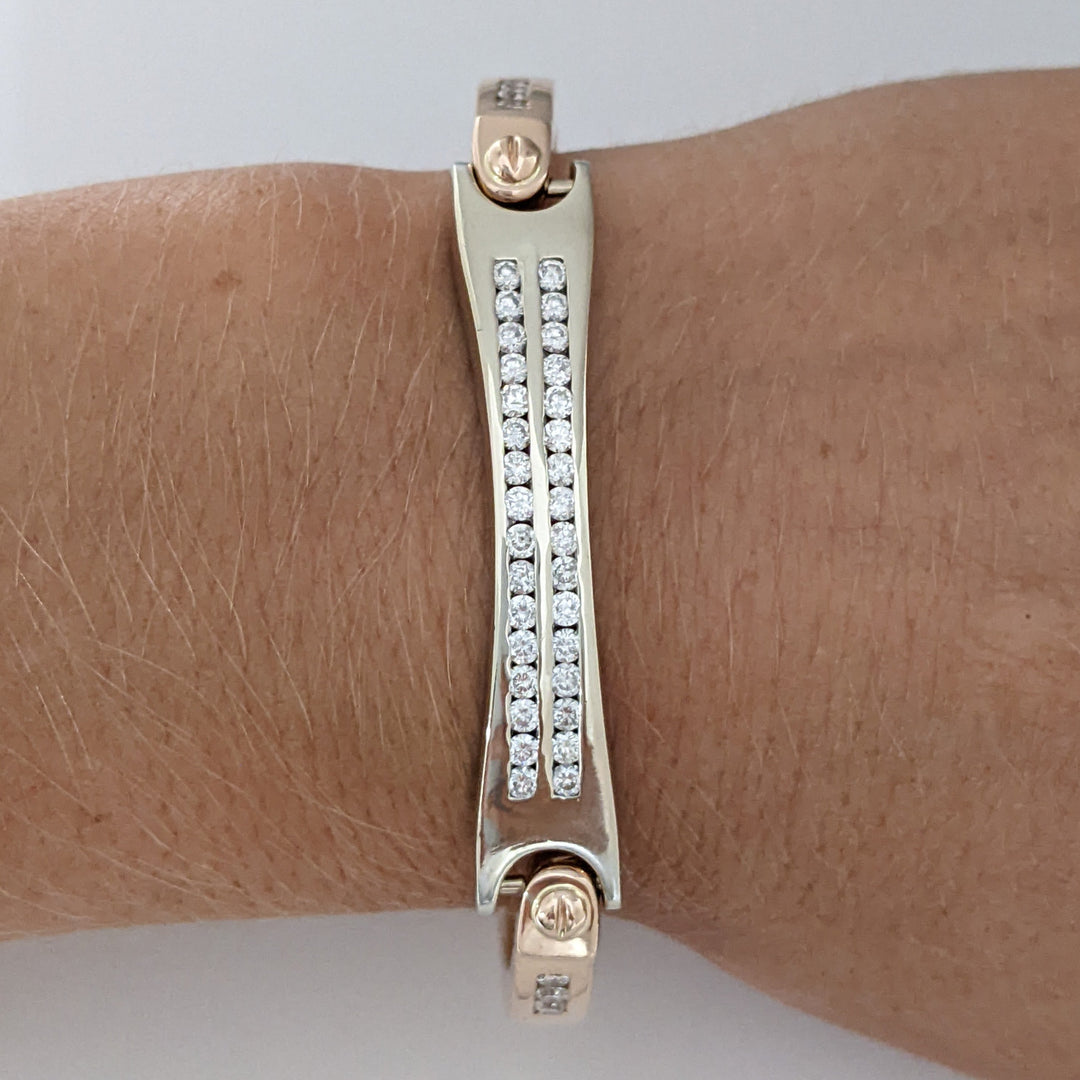 14K TWO- TONE 1.26 CARAT TOTAL WEIGHT I1 G DIAMOND ROUND (38) ESTATE CHANNEL-SET BRACELET 26.4 GRAMS